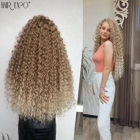 Honey blonde curly hair extensions style